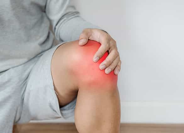 a-man-touching-knee-with-red-highlights-concept-of-knee-and-joint-pain