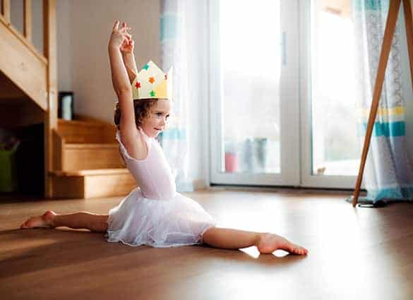 a-small-girl-with-a-princess-crown-at-home-doing