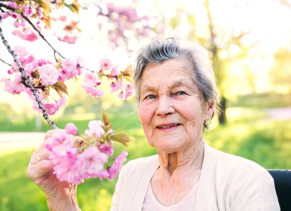 elderly-woman-in-spring-nature