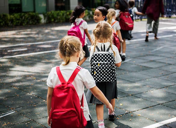 kindergarten-students-walking-crossing-school