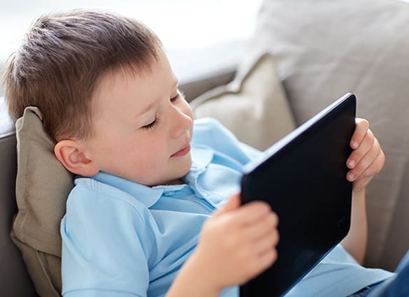 little-boy-with-tablet-pc-computer-at-home