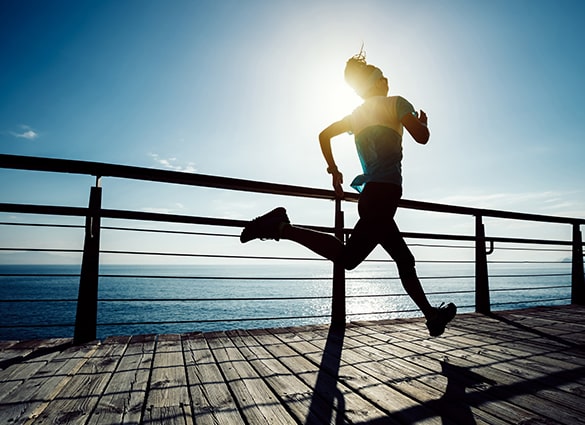 running-on-seaside-coast-boardwalk