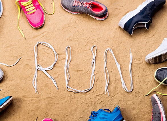 running-shoes-and-run-sign-made-of-shoelaces-sand