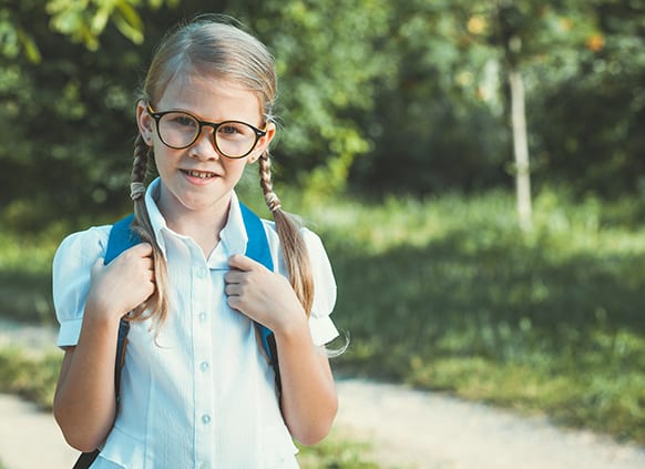 smiling-young-school-child-in-a-school-uniform